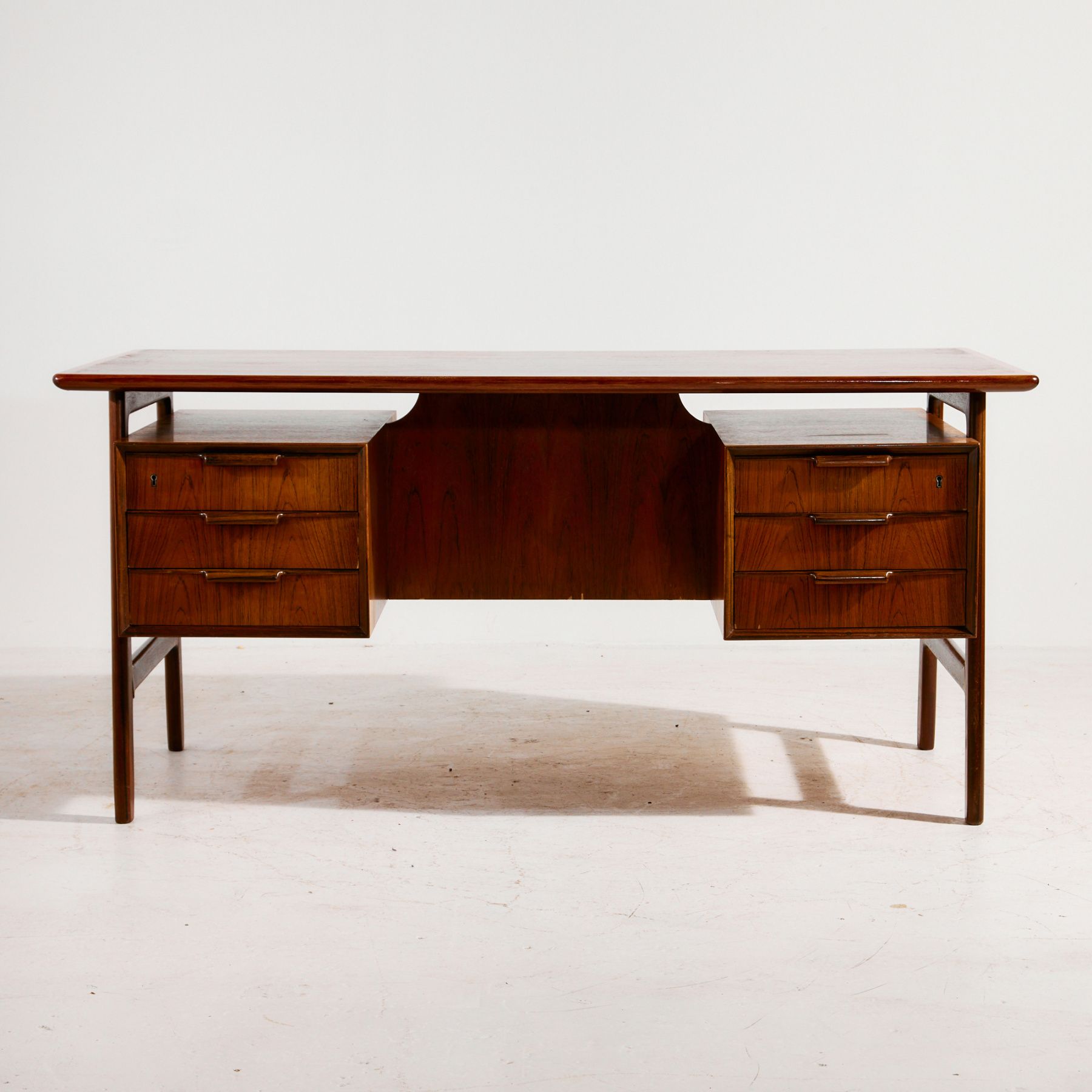 Model 75 rosewood desk by Gunni Omann for Omann Jun Møbelfabrik