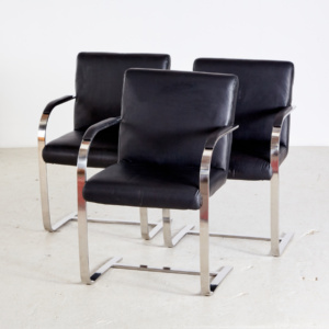Steel armchair with leather upholstery